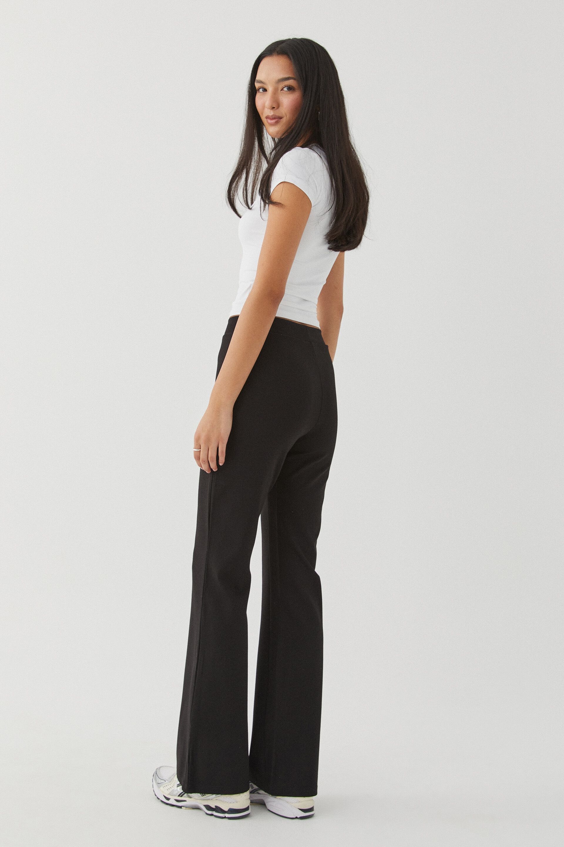 Buy AND Black Solid Rayon Flared Fit Women's Casual Pants | Shoppers Stop